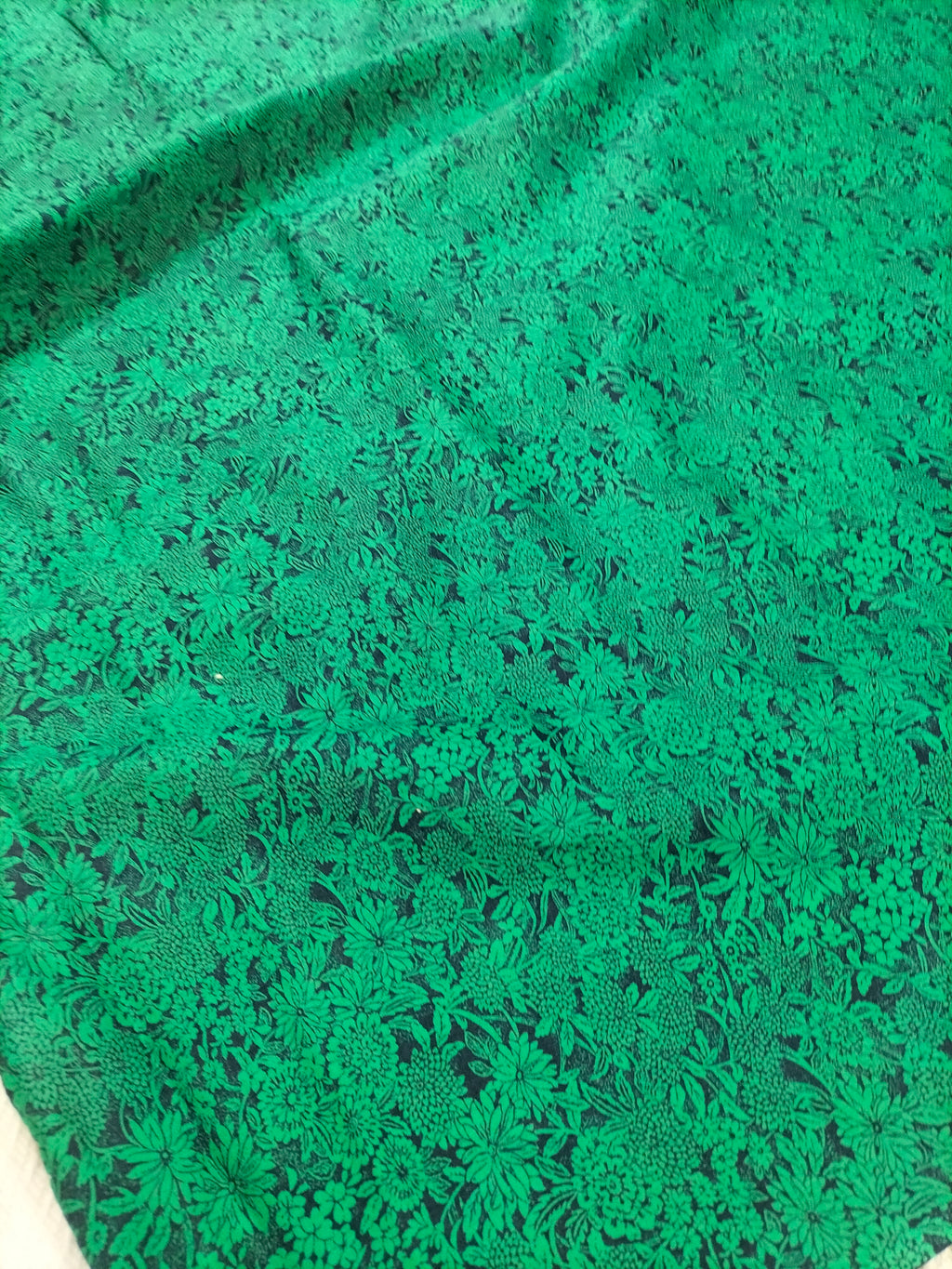 Cotone vintage dalla fantasia floreale verde