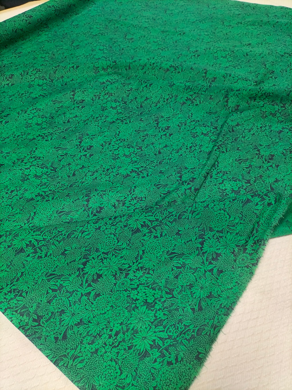 Cotone vintage dalla fantasia floreale verde